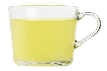 a cup of green herbal tea in a transparent glass cup. On a blank background