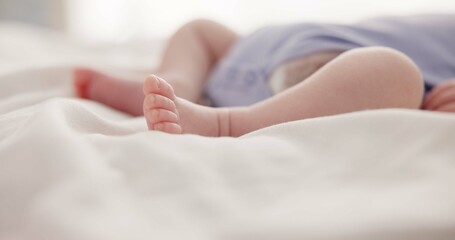 Sleeping, dreaming and feet of baby on bed for child care, resting and relax in nursery. Adorable, cute and closeup of toes of innocent newborn infant for health, wellness and development at home - obrazy, fototapety, plakaty