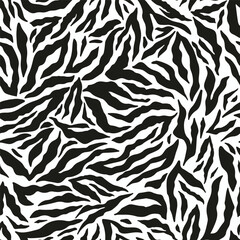 Seamless monochrome pattern design with abstract shapes. Zebra style vector texture.