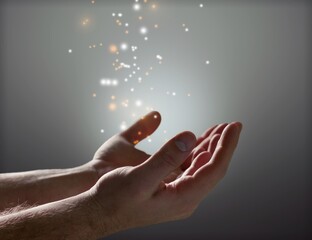 Christian prayer blessing hands with sparkle