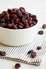 Organic Dried Cranberries in a Bowl, side view.