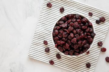 Organic Dried Cranberries in a Bowl, top view. Copy space.