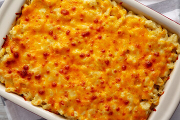 Homemade Baked Mac and Cheese in a Baking Dish, top view. Flat lay, overhead, from above. Close-up.
