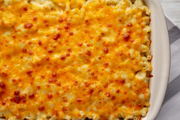 Homemade Baked Mac and Cheese in a Baking Dish, top view. Flat lay, overhead, from above. Close-up.