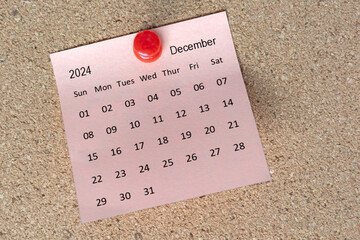 December 2024 calendar on sticky note. Reminder and 2024 new year concept