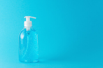 Hand sanitizer in a bottle on a bright background. Coronavirus prevention concept.