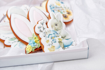 Easter decorated glazed cookies in the box. Spring cozy aesthetic food