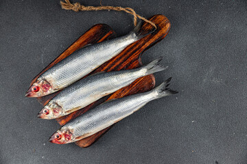 herring fish fresh raw seafood tasty fresh healthy eating cooking appetizer meal food snack on the...