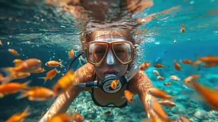 Poster woman in a mask diving underwater, snorkeling, ocean, swimming, coral reef, sea, blue water, beauty, fish, dive, summer, sport, vacation, active © Julia Zarubina