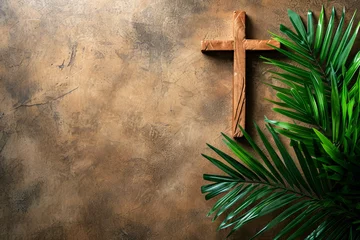 Fotobehang overhead view of a religious cross with palm leaves. Easter palm sunday background © ink drop