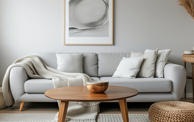 Interior of the living room. Furnished with a sofa, table, vase, and houseplants. Modern and minimalist style interior