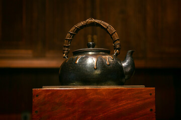Iron tea containers in a traditional tea house in Murakami City, Japan.