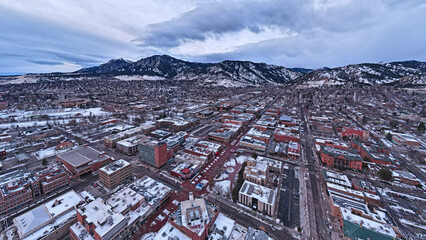 Pearl Street Mall in the winter, Boulder Colorado, with CU Boulder iand the flatirons in the background © Aaron