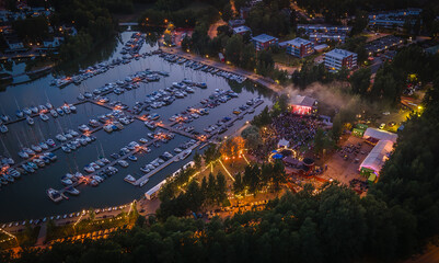 Evening aerial view of a festival in Espoo with colorful lights
View to dock with reflecting sunset...