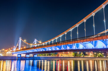 Fototapeta premium Krymsky Bridge or Crimean Bridge in Moscow at summer night