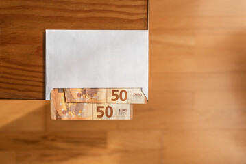 Envelope with money. €50 bills