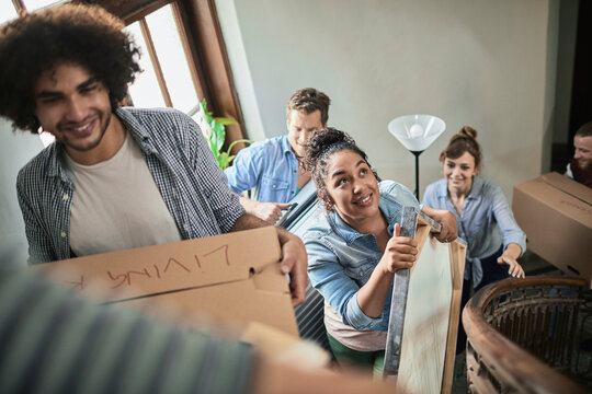 Group of friends moving into their new shared apartment