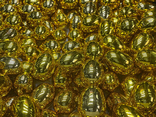 Abstract shiny golden prize eggs in amusement arcade
