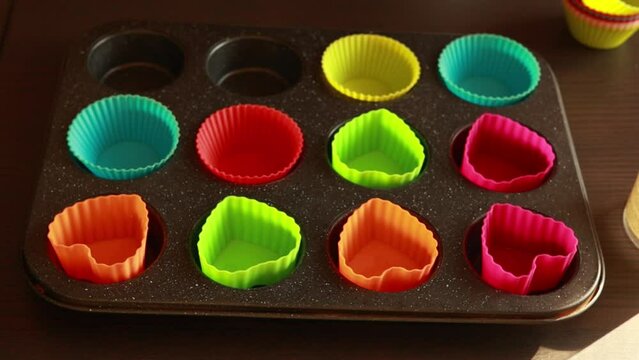 line up a muffin tray with silicon muffin cups