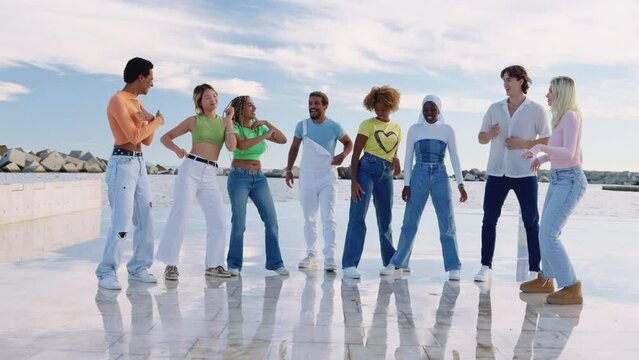 Slow motion dance party with diverse gen Z crowd