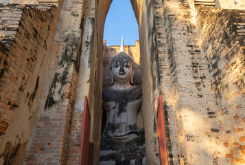 The buddha in Wat Si Chum in Sukhothai Historical Park, pagoda stupa, Sukhothai, Thailand. Thai...
