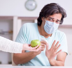 Young man suffering from allergy