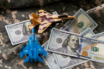 tank against the background of dollars. Concept of war. - obrazy, fototapety, plakaty
