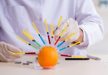 Naklejka premium Male nutrition expert testing food products in lab