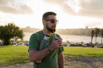 Man drinking chimarrão, mate (an infusion of yerba mate with ho - 715804212