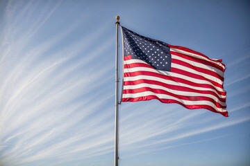 Obraz premium photo of the United States flag flying 10