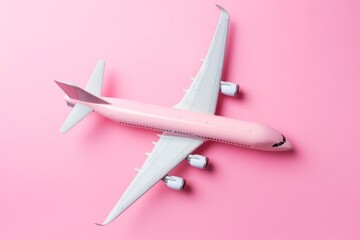 Airplane on pastel background with copy space. Flat lay design. Summer travel or vacation concept. Top view on creative composition with passenger plane on pastel pink background. Generative AI