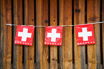swiss flags with wooden background - 715814601