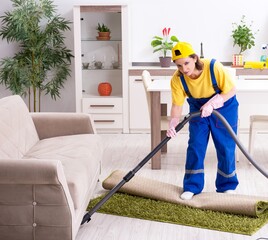 Old female contractor doing housework