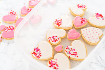 Heart-shaped sugar cookies with royal icing