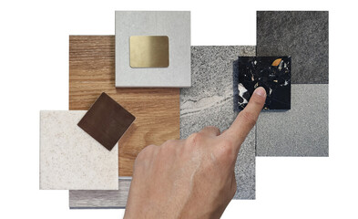 interior designer chooses finishing material samples including stone granite tiles, terrazzo,...
