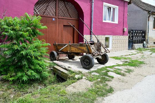 old farm wagon, self-made trailer or carriage for a team of horses on a farm, Calnic, Transylvania, Romania, July 11, 2023