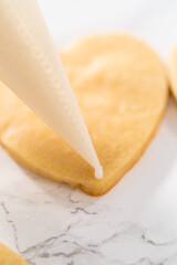Heart-shaped sugar cookies with royal icing