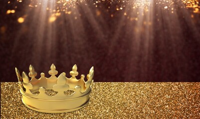 image of beautiful gold queen or king crown on desk