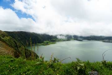 The lake Lagoa das Sete Cidades is located in the crater of a volcano on the island of Sao Miguel,...