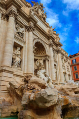 Fototapeta na wymiar Trevi fountain in the center in Rome, Italy. Trevi is most famous fountain of Rome