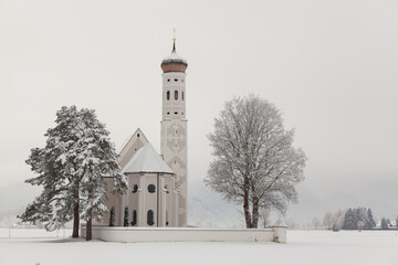 St. Coloman Church in winter landscape - obrazy, fototapety, plakaty
