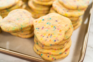 Packing Sprinkle-Adorned Sugar Cookies into Boxes