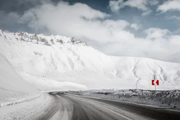 Fotobehang snow winter mountain road. blizzard. © tarasov_vl