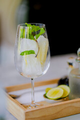 This menu lemon juice made by soaking lemons in water to form ice to add interest.