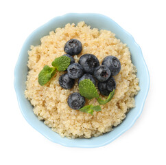 Tasty quinoa porridge with blueberries and mint in bowl isolated on white, top view