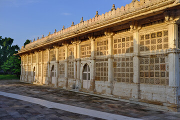 Fototapeta na wymiar Stone facade with Jali or jaali of Tomb at Sarkhej, Ahmedabad, Gujarat, India