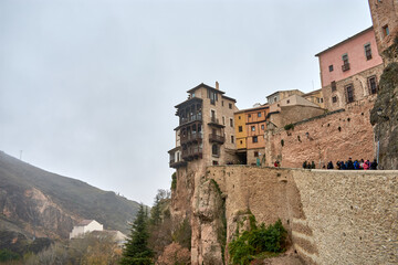 Fototapeta na wymiar Hanging house on the cliff with wooden balconies in Cuenca, Spain