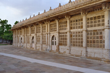 Fototapeta na wymiar Stone facade with Jali or jaali of Tomb at Sarkhej, Ahmedabad, Gujarat, India