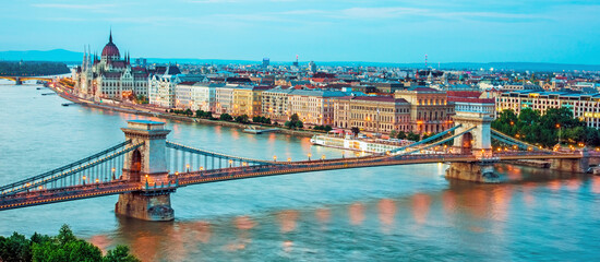 The picturesque landscape of the Parliament and the bridge over the Danube in Budapest, Hungary.