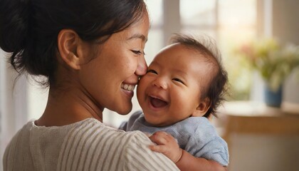 over-the-shoulder view of a joyful mother holding her laughing baby
